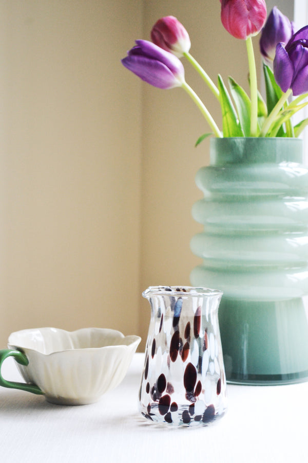 Brown and White Speckled Small Glass Jug