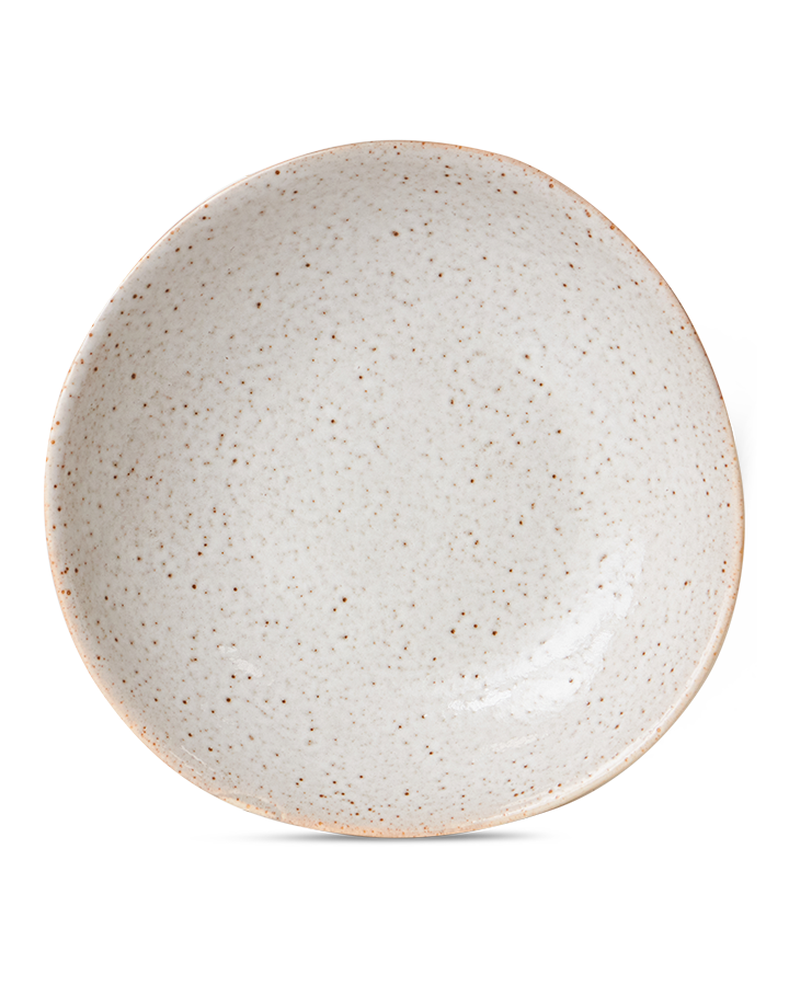 Speckled ceramic plate on a white background