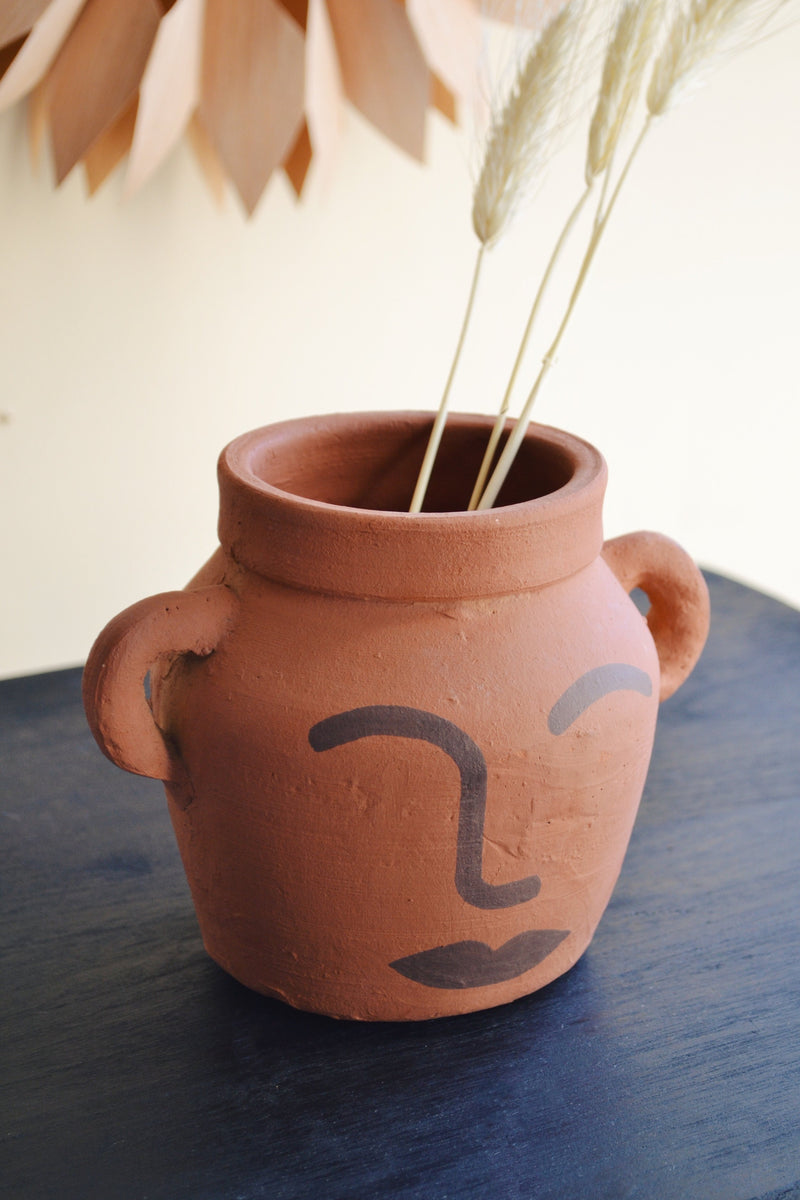 Terracotta Vase with Face